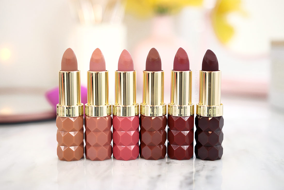 milani-color-fetish-matte-nudes-collection-review | Slashed Beauty Open tubes of Milani Color Fetish Matte The Nudes Collection standing on a marble surface | Milani Color Fetish Matte The Nudes Collection Review & Swatches | Slashed Beauty